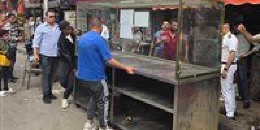 رفع 300 حالة إشغال وتعديات من المحال والمنشآت التجارية وعربات المأكولات بالجيزة - الهلال الإخباري